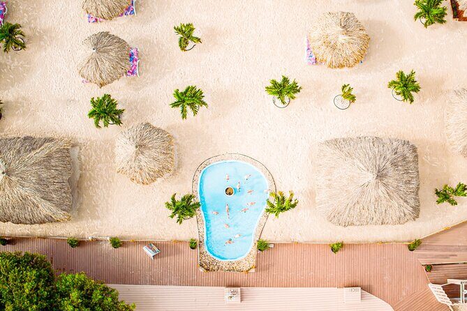 Aruba De Palm Island All-Inclusive Day Trip with Transport - Water slides, kids water park, and banana boat rules you should not ignore