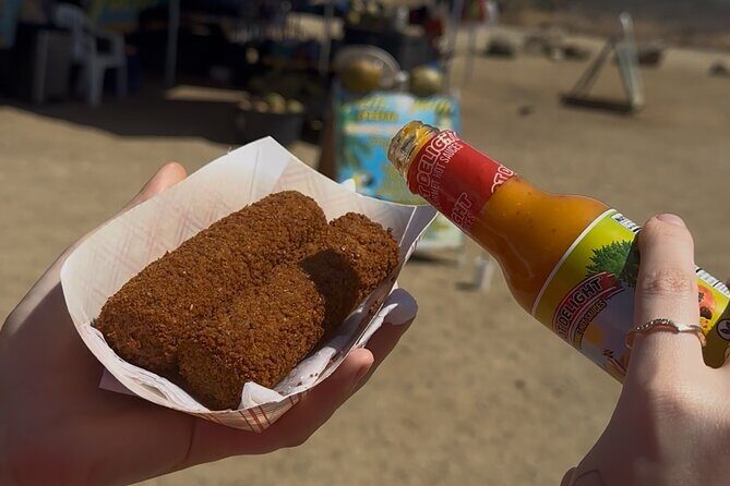 Aruba Eats Sip and Savor Local Food Tour - Plaza Nicky Habibe sit-down: keshi yena, funchi, and goat stew