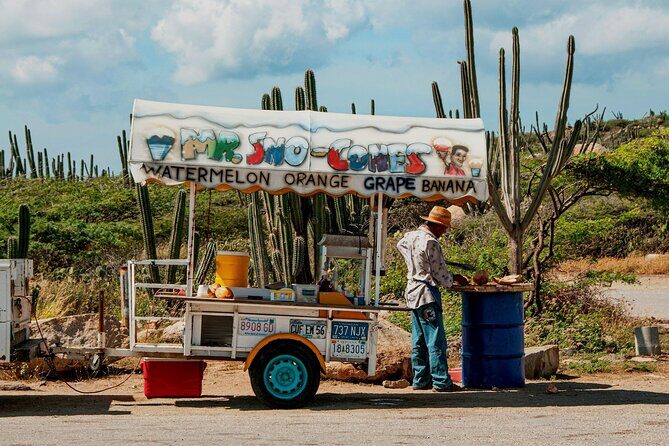 Aruba Eats Sip and Savor Local Food Tour - I Love Aruba sign photo break you won’t overthink
