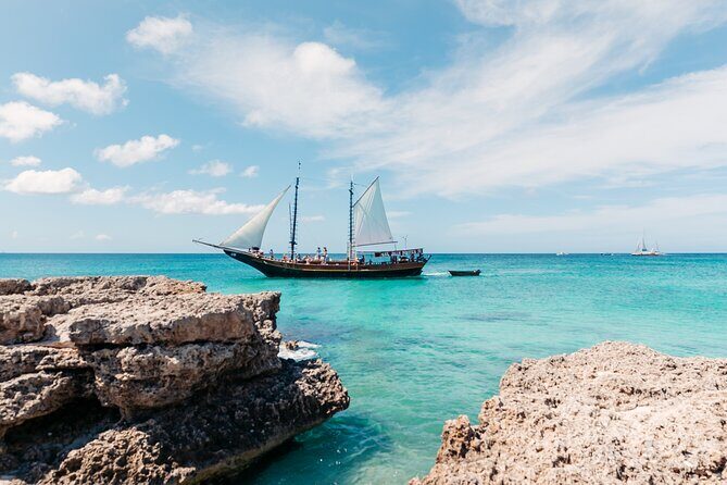 Aruba Jolly Pirate Afternoon Sail with Snorkeling - Rope Swing at the Last Stop: The “Everyone Tries It” Moment
