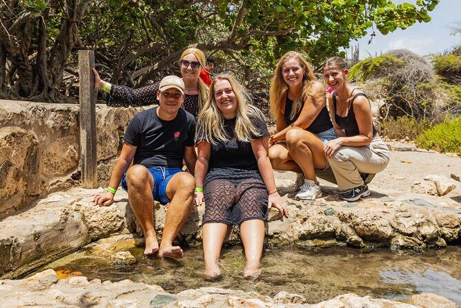 Aruba National Park Tour with Natural Pool & Baby Beach Snorkel - Stop 3: Fontein Cave + fish pedicure at the pond (20 minutes, lots of wow)