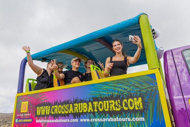 Aruba National Park Tour with Natural Pool & Baby Beach Snorkel - Driving back through San Nicolas: murals and local color