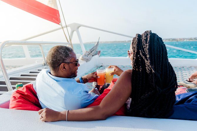 Aruba Sunset Sail with Caribbean Dinner and Live Music - Before dinner: steel-drum music plus an open bar on a catamaran