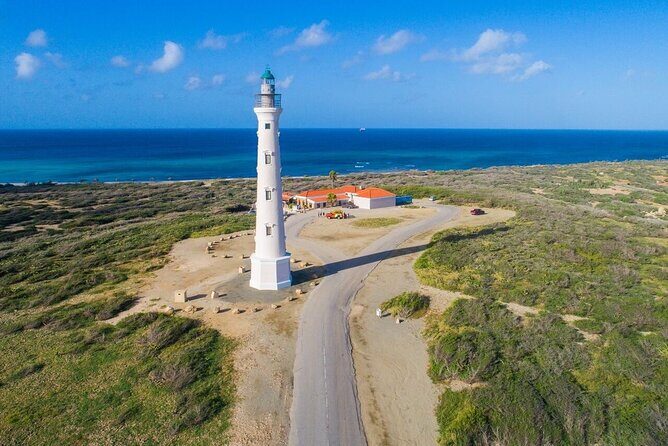 Full day Aruba Island Private Jeep Tour Arikok Park - Drone Shots - Tres Trapi steps snorkeling: crystal-clear water and turtle chances