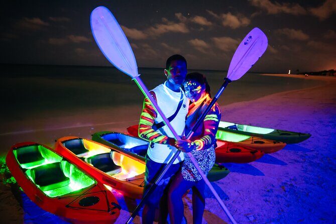 Glow Through the Night with LED Kayak Adventure in Aruba - On the Water: Calm Caribbean Paddling Under City Lights