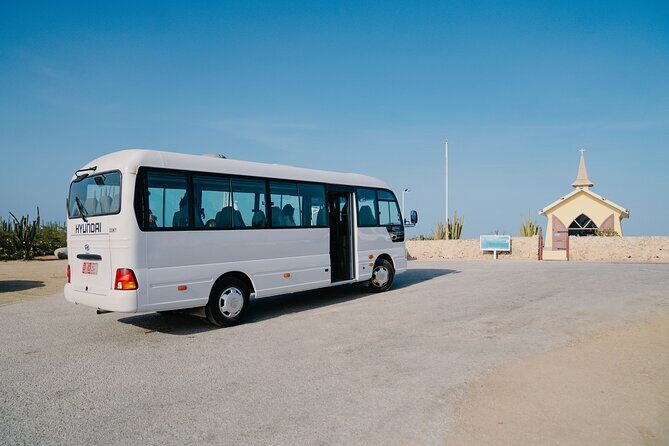 Half-Day Aruba Island Tour from Oranjestad - Bushiribana Gold Mill Ruins + Natural Bridge: Red Sand, Blue Ocean, and Photo Magic