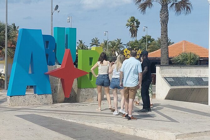 Half-Day Aruba Sightseeing Tour & Beach in an Air-condition Bus - Arashi Beach time: calm water, snorkeling-friendly rocks