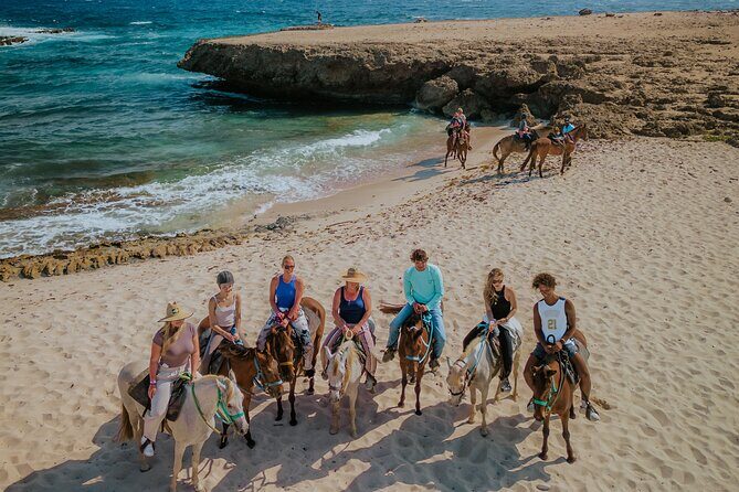 Horseback Riding and Natural Pool Adventure in Aruba - Wariruri Bay on horseback: shoreline riding and picture moments