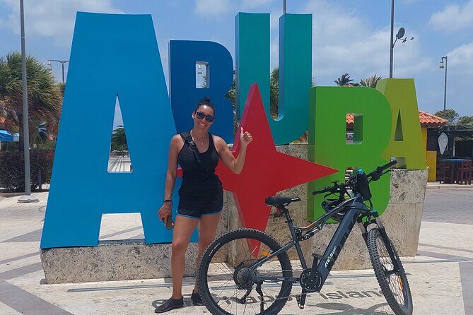 Oranjestad Culture Heritage and Coastal Electric Bike Experience - Paardenbaai and the Artsy Blue Horses Near the Cruise Terminal
