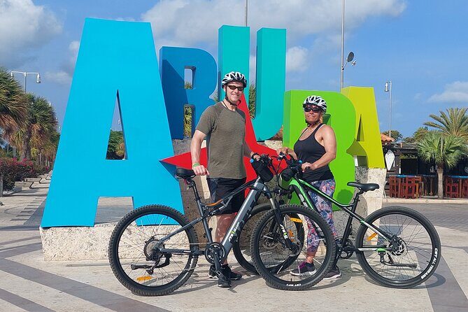 Oranjestad Culture Heritage and Coastal Electric Bike Experience - Oranjestad on Two Wheels: Colorful Architecture and Plaza Time