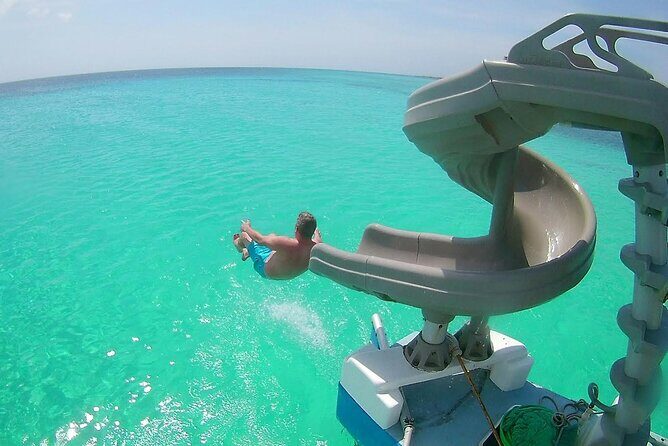 Private Catamaran Adventure Cruise with Rope Swing and Water Slide - Where you meet the catamaran in Noord