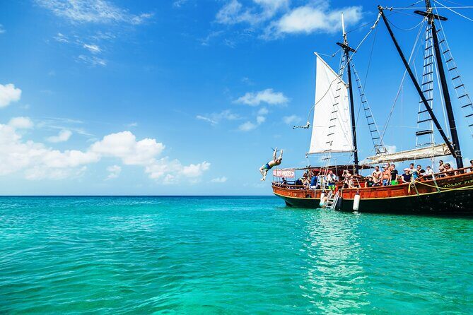 Set Sail in Aruba: Jolly Pirate Cruise with Snorkel Adventure - Rope swing on a schooner: fun, not just for daredevils